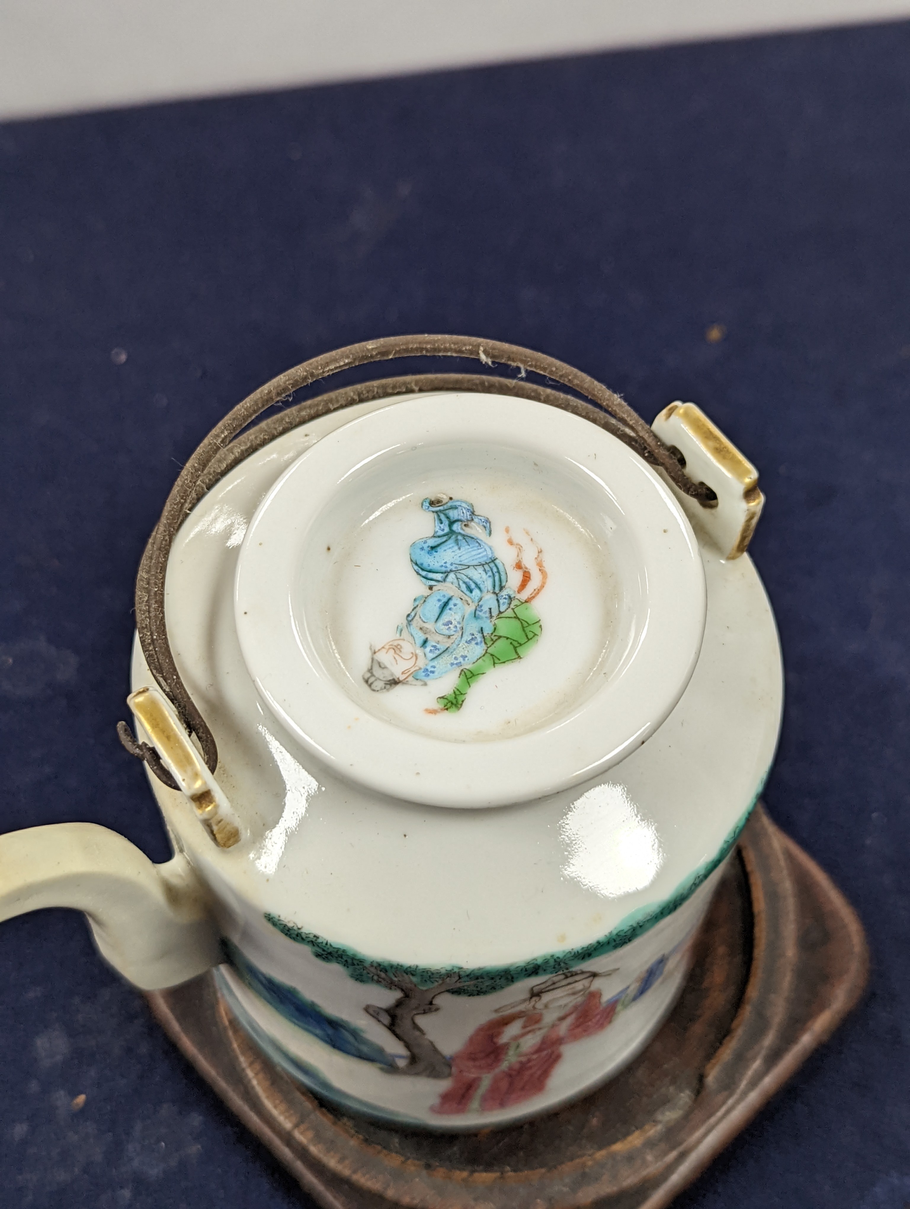 A Chinese famille rose cylindrical teapot and cover, 19th century 11cm, wood stand